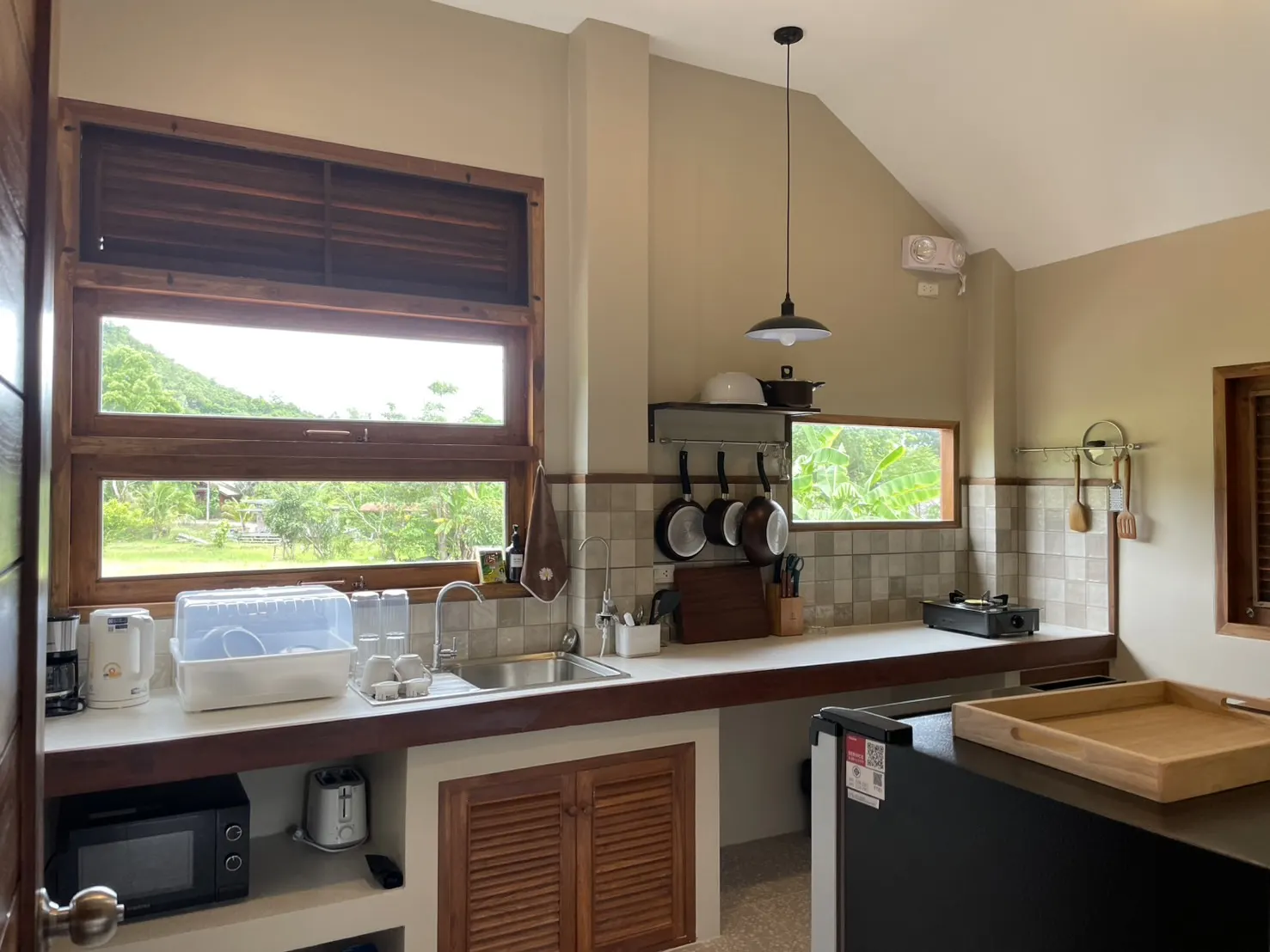 Kitchen with a wide window over the fields
